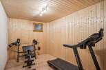 This home gym offers a dedicated space for fitness enthusiasts.