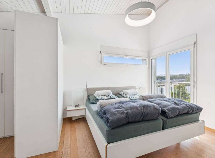 Experience modern living in this bright and airy bedroom.