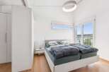 Experience modern living in this bright and airy bedroom.