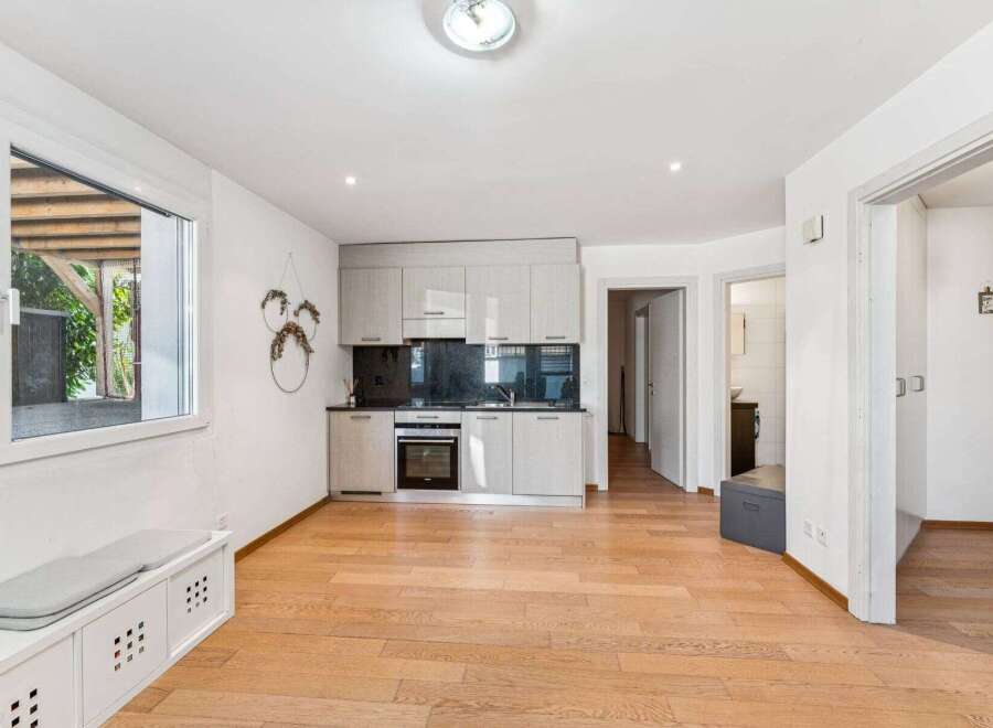 Discover this charming property featuring a modern kitchen with sleek cabinetry and appliances.