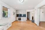 Discover this charming property featuring a modern kitchen with sleek cabinetry and appliances.