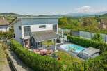 Discover your dream home with this stunning property! This modern residence boasts a private pool, perfect for relaxation and entertaining.
