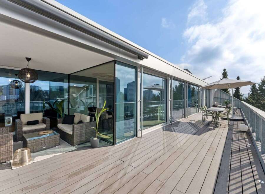 Experience luxury living with this stunning property featuring a spacious outdoor terrace.