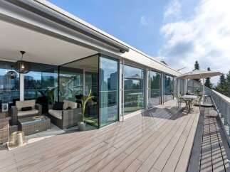 Experience luxury living with this stunning property featuring a spacious outdoor terrace.