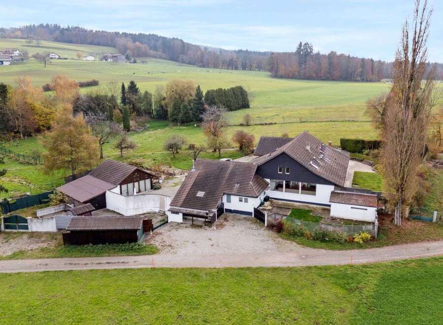 Discover this stunning property nestled in a picturesque landscape, offering a blend of modern living and natural beauty.