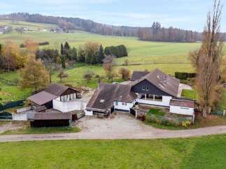 Discover this stunning property nestled in a picturesque landscape, offering a blend of modern living and natural beauty.