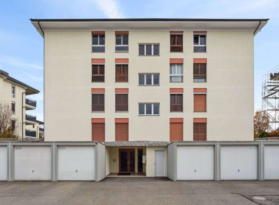 This modern apartment building offers a blend of style and functionality.