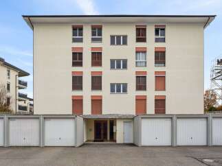 This modern apartment building offers a blend of style and functionality.