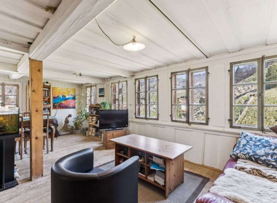 Step into a charming living space with rustic elegance.
