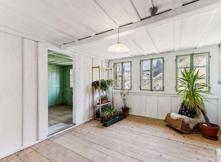 Discover the charm of this sun-drenched room, perfect for relaxation and enjoying natural light.