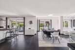 This stunning property boasts a modern open-plan living space, perfect for entertaining.