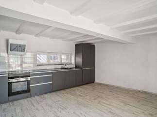 Discover modern living in this stylish kitchen! Featuring sleek cabinetry, a built-in oven, and a contemporary design, this space is perfect for culinary enthusiasts.