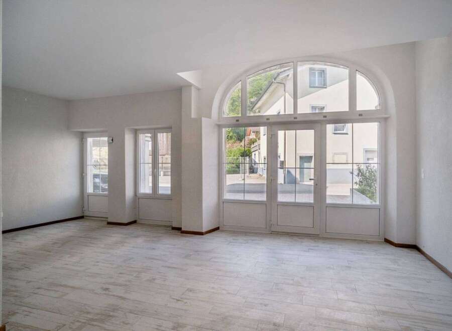 Discover this bright and airy property featuring stunning architectural details.