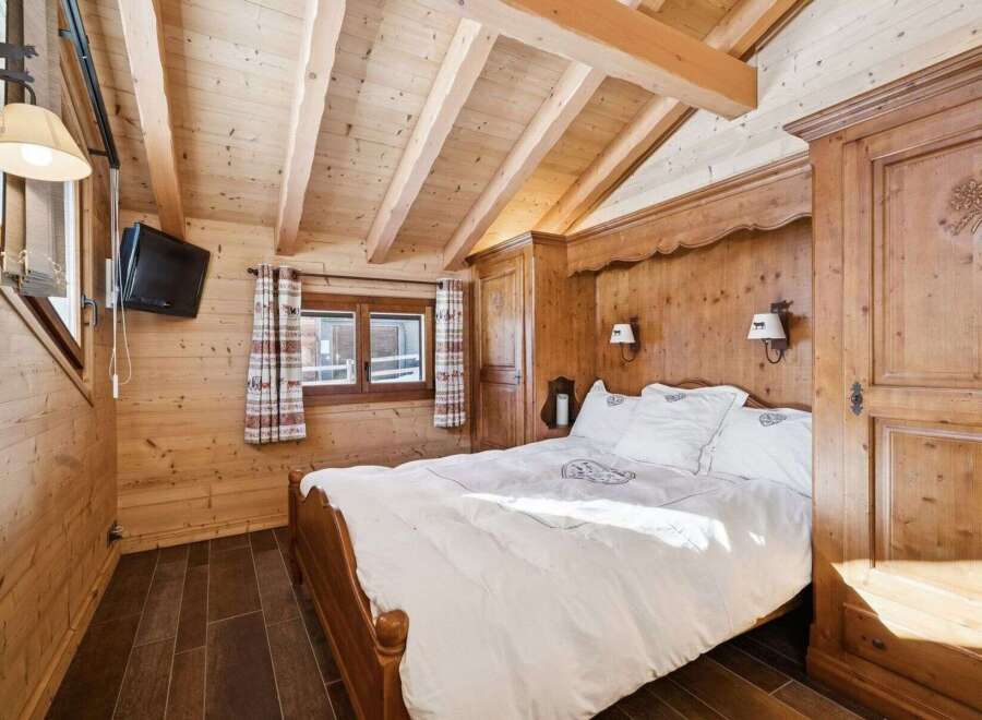 Experience rustic charm in this cozy bedroom.