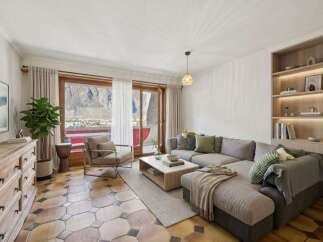 This stunning living space offers breathtaking mountain views, creating a serene and inviting atmosphere.