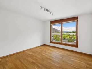 This bright and airy room features stunning views through large windows.