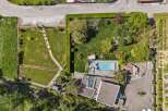 Discover a stunning property featuring a luxurious pool and meticulously landscaped grounds.