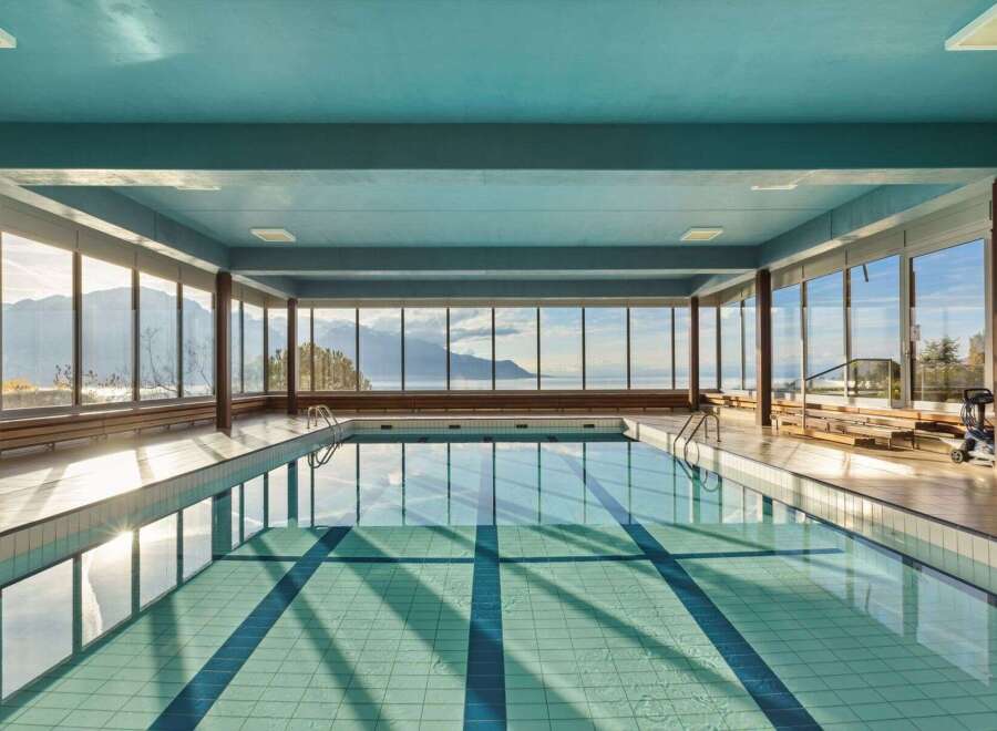 Experience luxury and tranquility in this stunning indoor pool with breathtaking views.