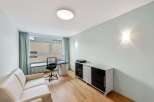 Discover this stylish and modern office space, perfect for remote work or a home-based business.