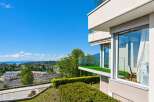 Experience modern living with stunning panoramic views from this property's expansive balconies.