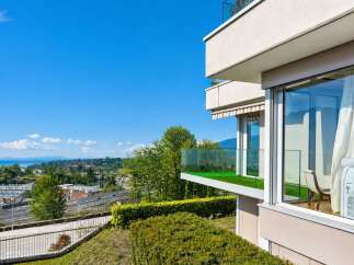 Experience modern living with stunning panoramic views from this property's expansive balconies.