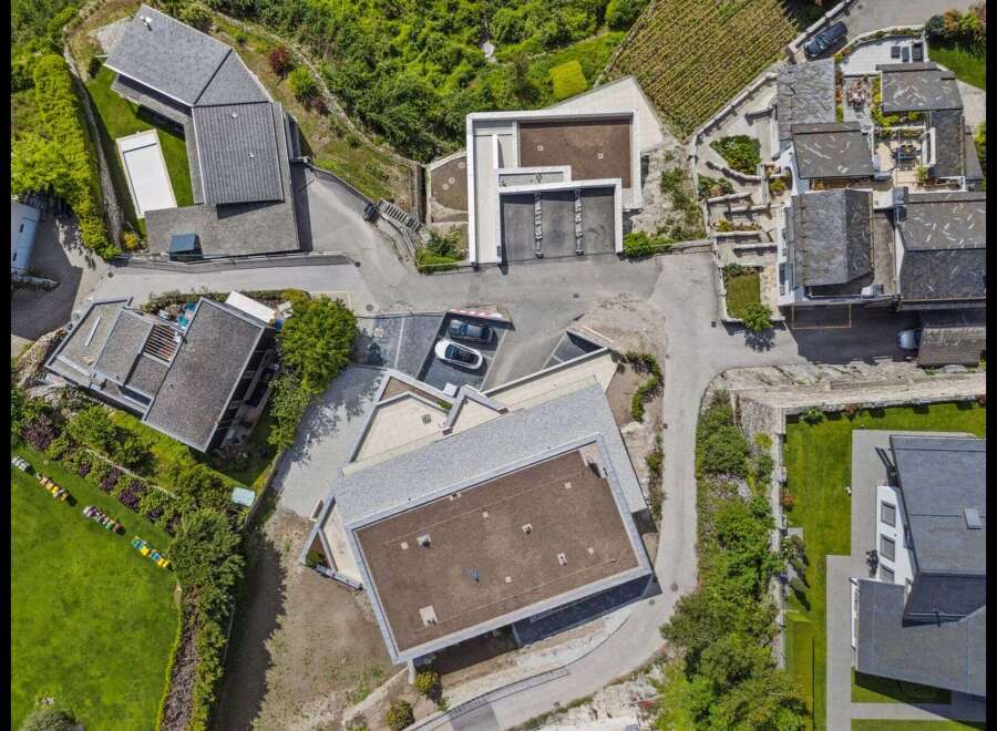 Discover a stunning modern property nestled in a picturesque landscape.