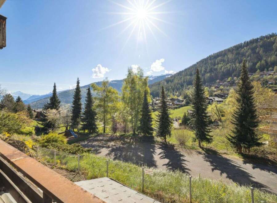 Experience breathtaking mountain views from this stunning property.