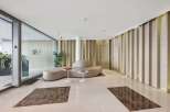 Step into luxury with this stunning property, showcasing a modern lobby design.