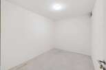 Discover this versatile, empty room, perfect for storage or as a blank canvas for your needs.