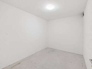 Discover this versatile, empty room, perfect for storage or as a blank canvas for your needs.