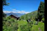 Escape to your dream home nestled in the heart of nature, offering breathtaking mountain views and a serene atmosphere.