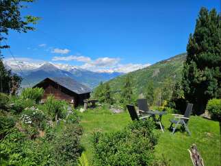 Escape to your dream home nestled in the heart of nature, offering breathtaking mountain views and a serene atmosphere.