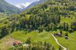 Discover your dream home nestled in the heart of nature! This stunning property boasts breathtaking mountain views and lush green surroundings.