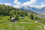 Nestled in a picturesque mountain landscape, this charming property offers a serene escape.