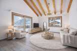 Experience the epitome of mountain living in this stunning property! This home boasts a bright and airy living space with a cozy fireplace, perfect for those chilly evenings.