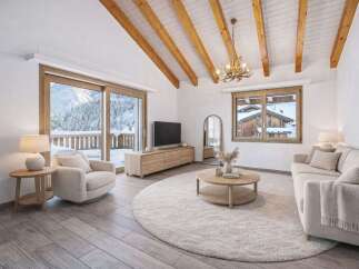 Experience the epitome of mountain living in this stunning property! This home boasts a bright and airy living space with a cozy fireplace, perfect for those chilly evenings.