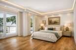 Step into luxury with this stunning bedroom featuring a modern design and elegant finishes.