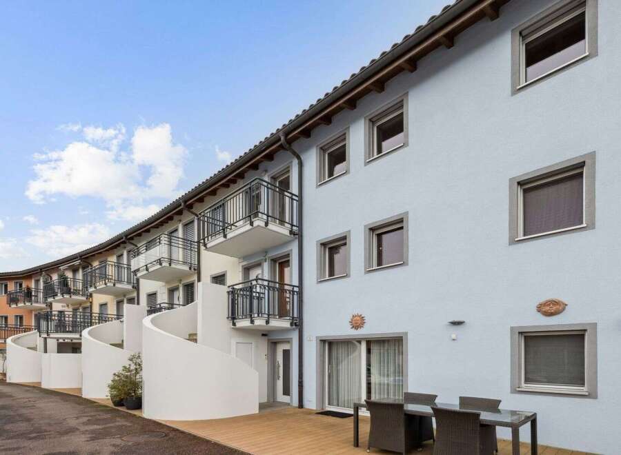Discover modern living in this stunning property featuring stylish balconies and a contemporary design.