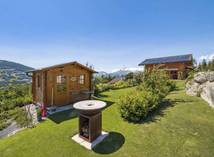 Escape to your own private oasis with this stunning property! This charming home boasts a cozy wooden cabin, perfect for relaxation and entertaining.