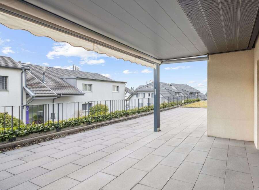 Enjoy the outdoors from this beautiful patio space.