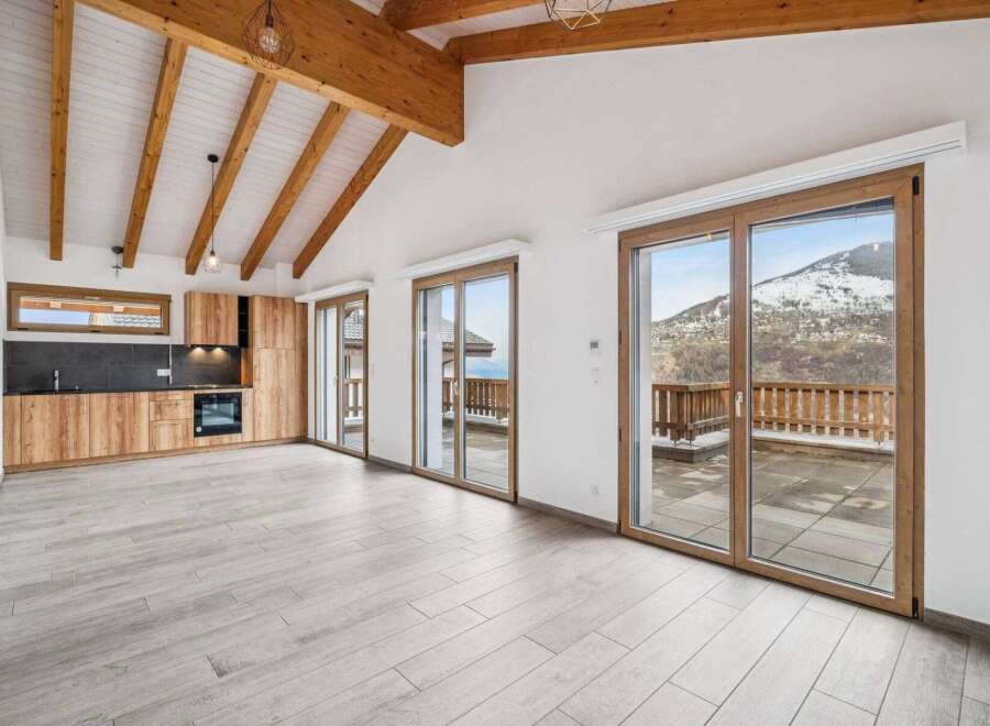 Discover the charm of this stunning property, featuring a modern kitchen with sleek appliances and ample storage.