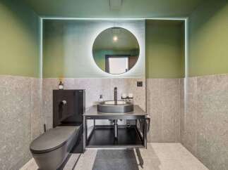 Step into modern luxury with this stunning bathroom design.