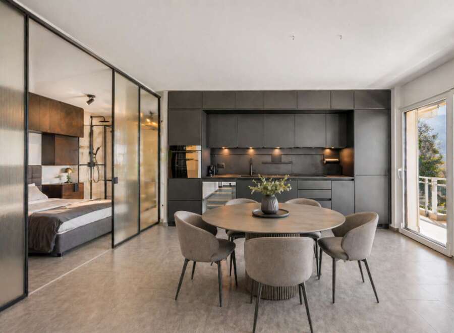 Experience modern luxury in this stunning property, featuring a sleek, open-plan design.