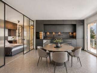 Experience modern luxury in this stunning property, featuring a sleek, open-plan design.