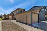This stunning property boasts a beautiful exterior with a charming garage and a welcoming pathway.