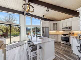 This stunning kitchen boasts a modern design with high-end finishes.
