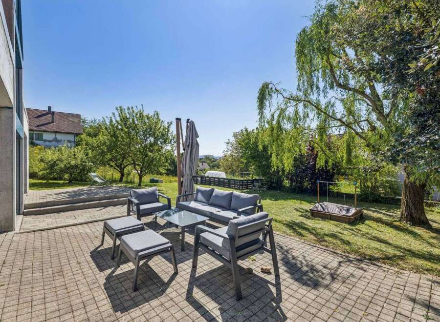 Enjoy outdoor living at its finest with this stunning property! This home features a beautifully designed patio area, perfect for entertaining or relaxing.