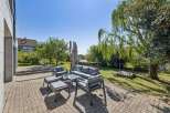 Enjoy outdoor living at its finest with this stunning property! This home features a beautifully designed patio area, perfect for entertaining or relaxing.
