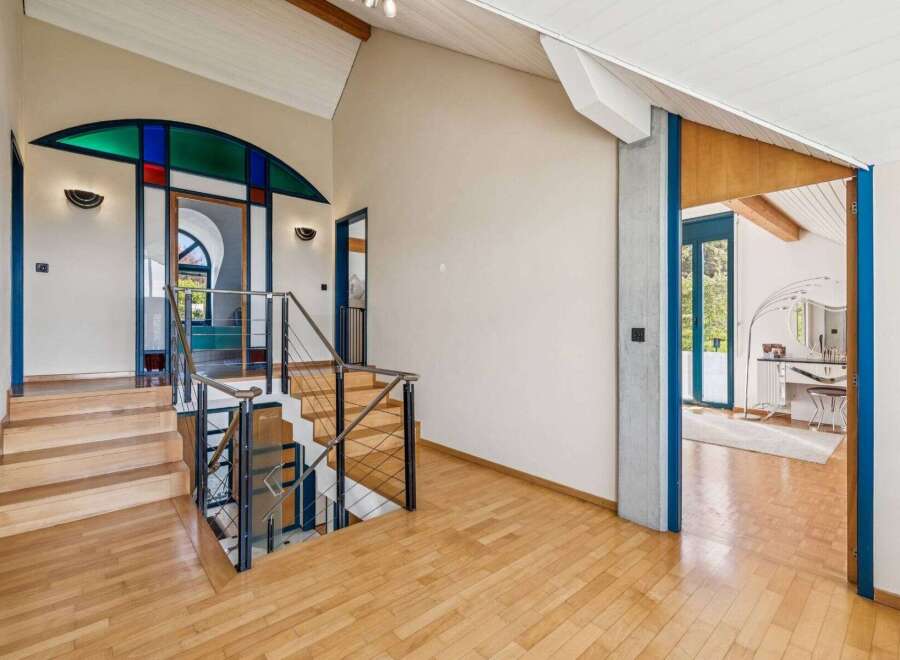 Step into this stunning property and be captivated by its unique architectural design.
