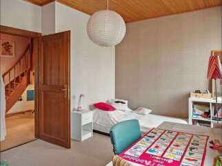 Discover this charming bedroom, perfect for a cozy retreat.